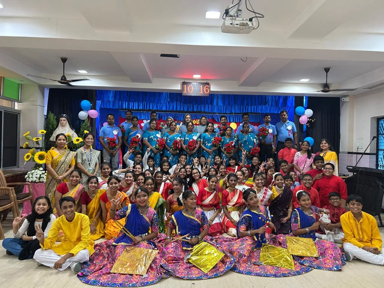 Students performing cultural program on May Day at Holy Family Convent School, Liluah